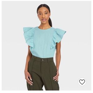 Ruffle linen top. Never worn